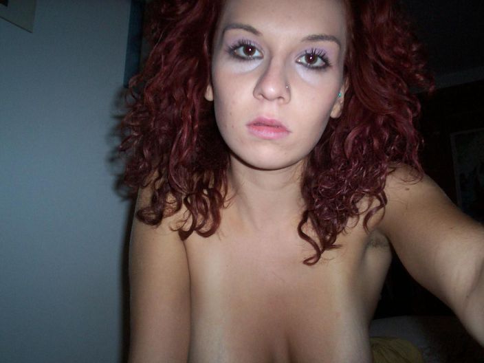 Redhead babe topless