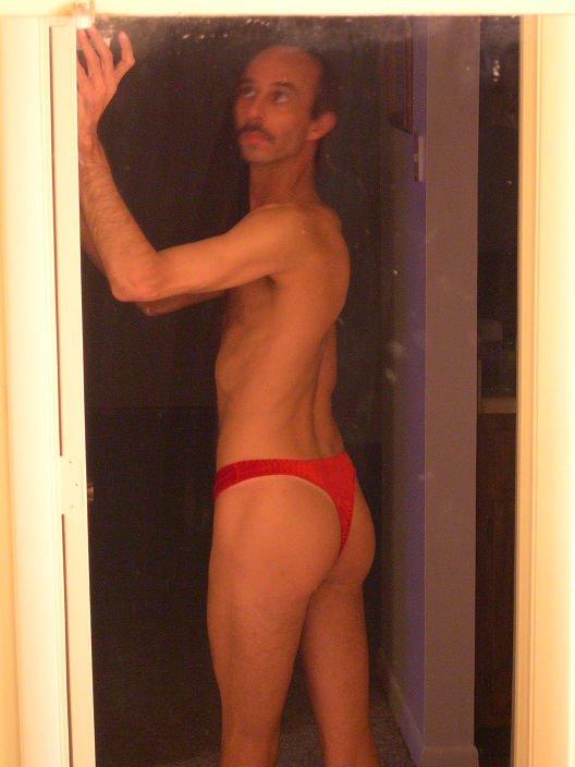 dressed to impress in a red thong